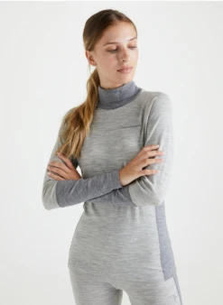 PEAK PERFORMANCE MAGIC ROLLNECK WOMEN Med Grey Melange -Snowboard Gear Shop schermafbeelding 2022 10 22 om 11.21.56